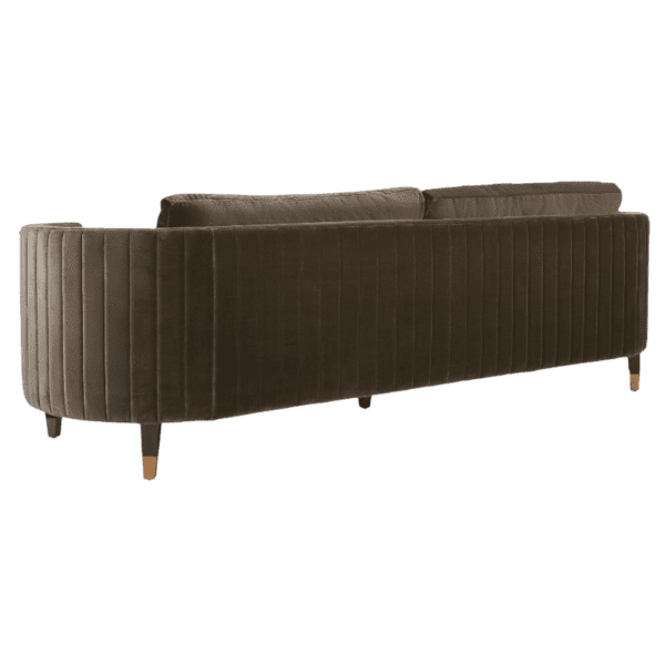 A brown velvet sofa with wooden legs.