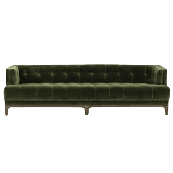 A green velvet sofa with wooden legs.
