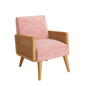 A pink velvet chair with wooden legs.