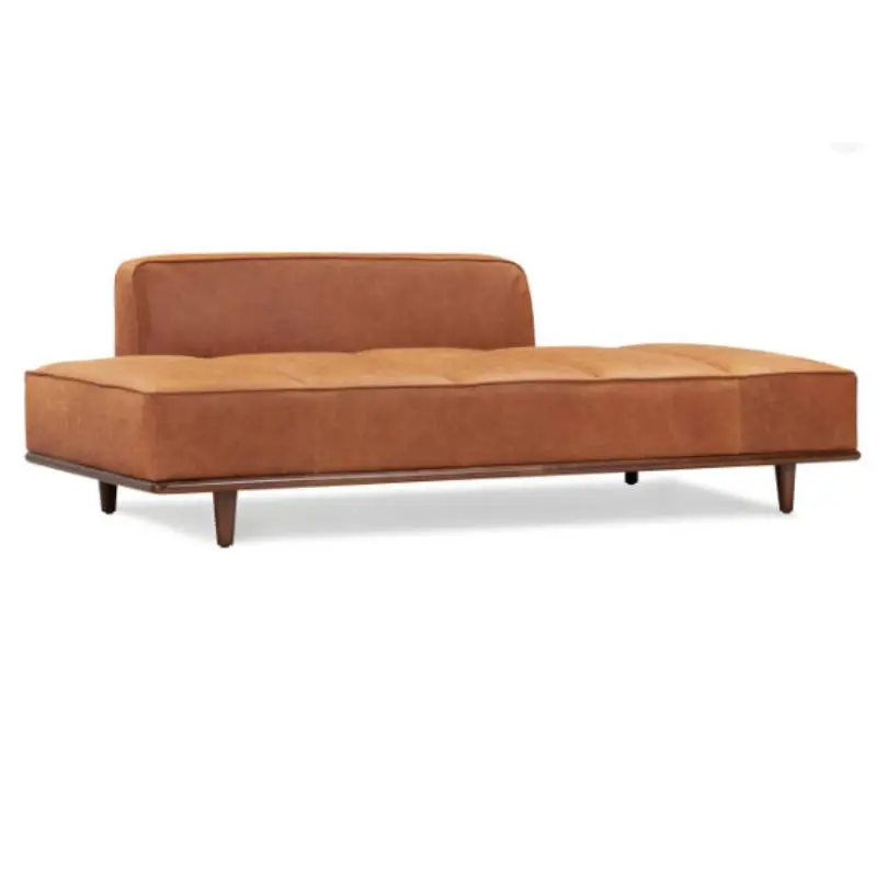 A Boulder Sofa with wooden legs.