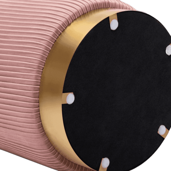 A pink and gold ottoman with a black base.